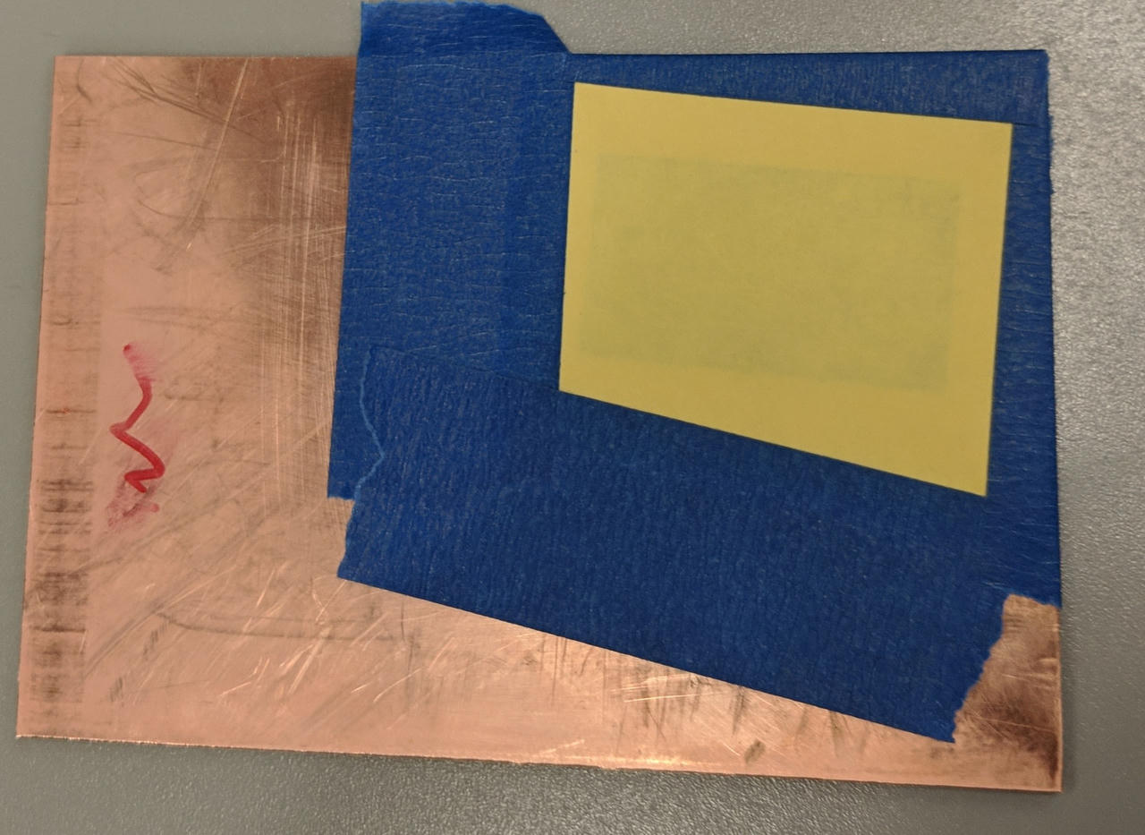 Paper taped to board