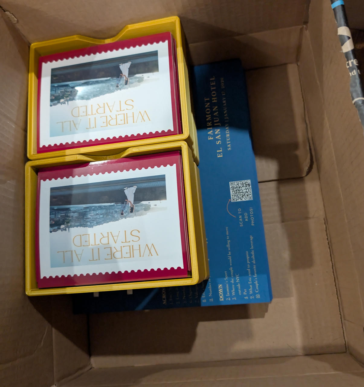 Finished programs and postcard in box