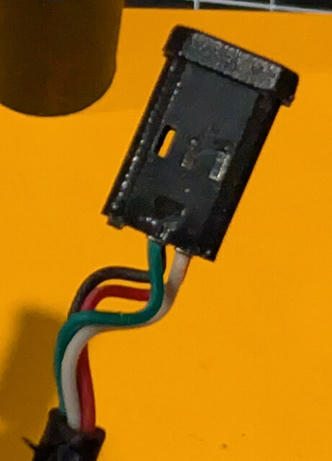 Inner plastic contact holder removed from the metal shell